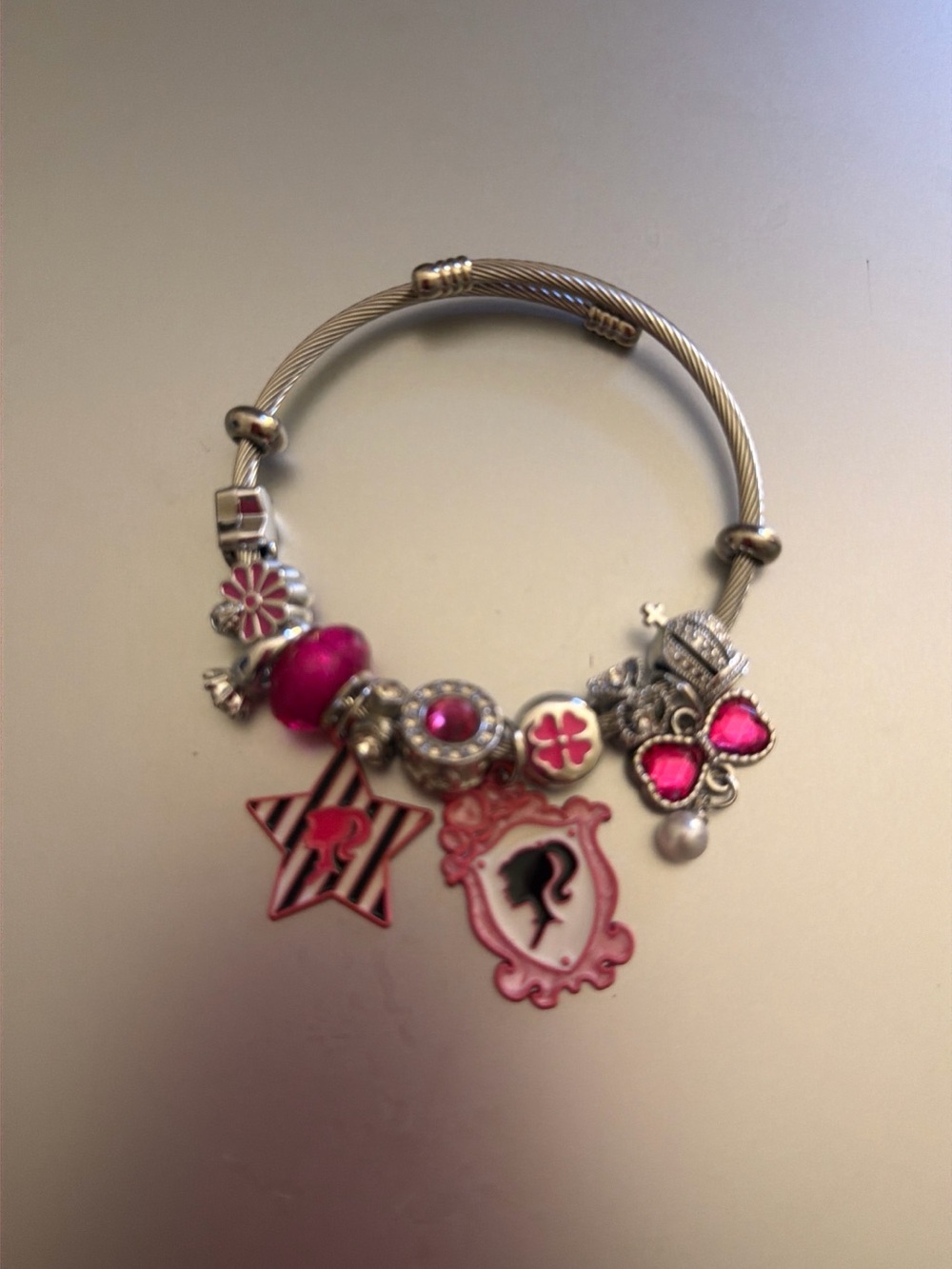 Silver-Tone Bracelet with Bright Pink Charm Accents